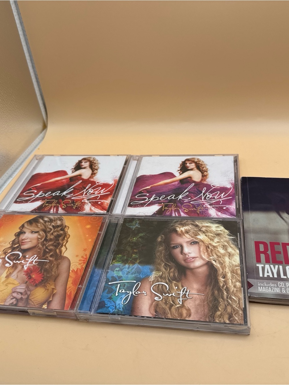 Taylor Swift lit 4 CD Set with Red, Purple, Orange, Blue & Black Accents